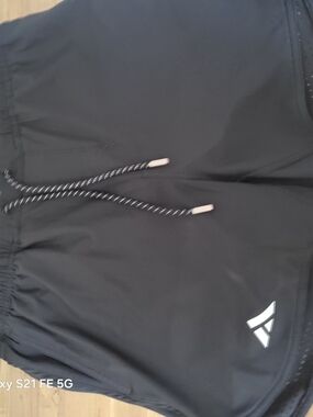 Women’s Black Athletic Shorts with Reflective Logo